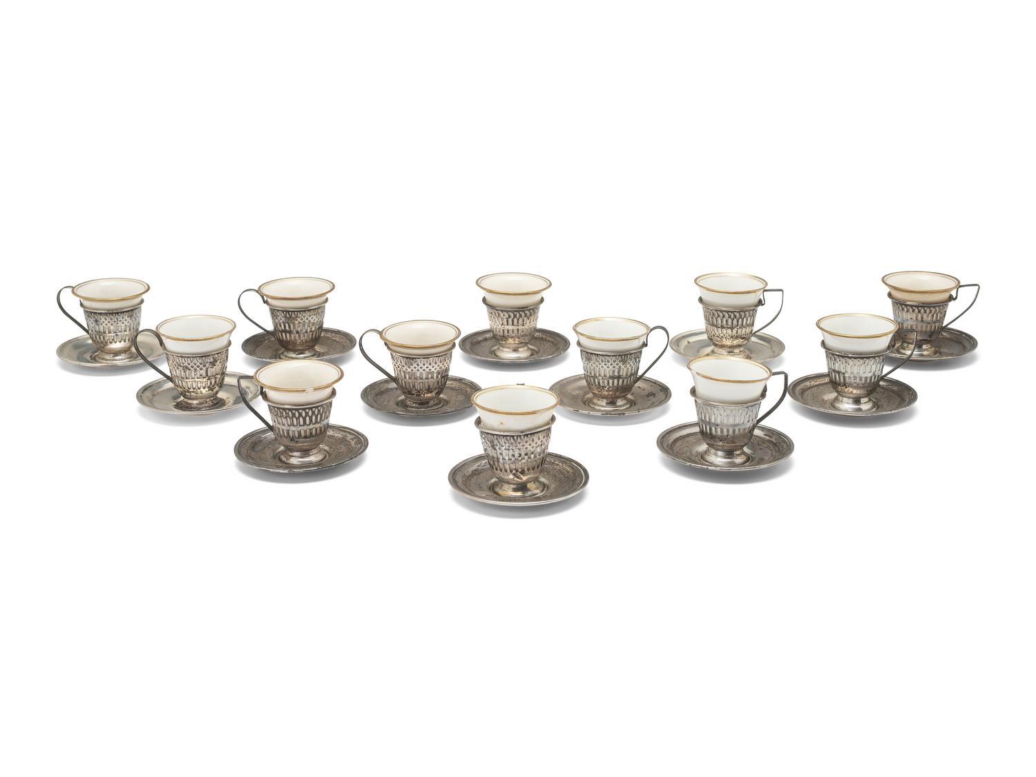 A Set of Twelve American Silver Coffee Cups and Saucers