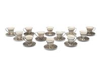 A Set of Twelve American Silver Coffee Cups and Saucers