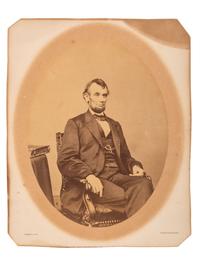[LINCOLN, Abraham (1809-1865)]. BERGER, Anthony, photographer. Albumen photograph of Abraham Lincoln. [Washington, DC: Mathew Brady Gallery, 1864].