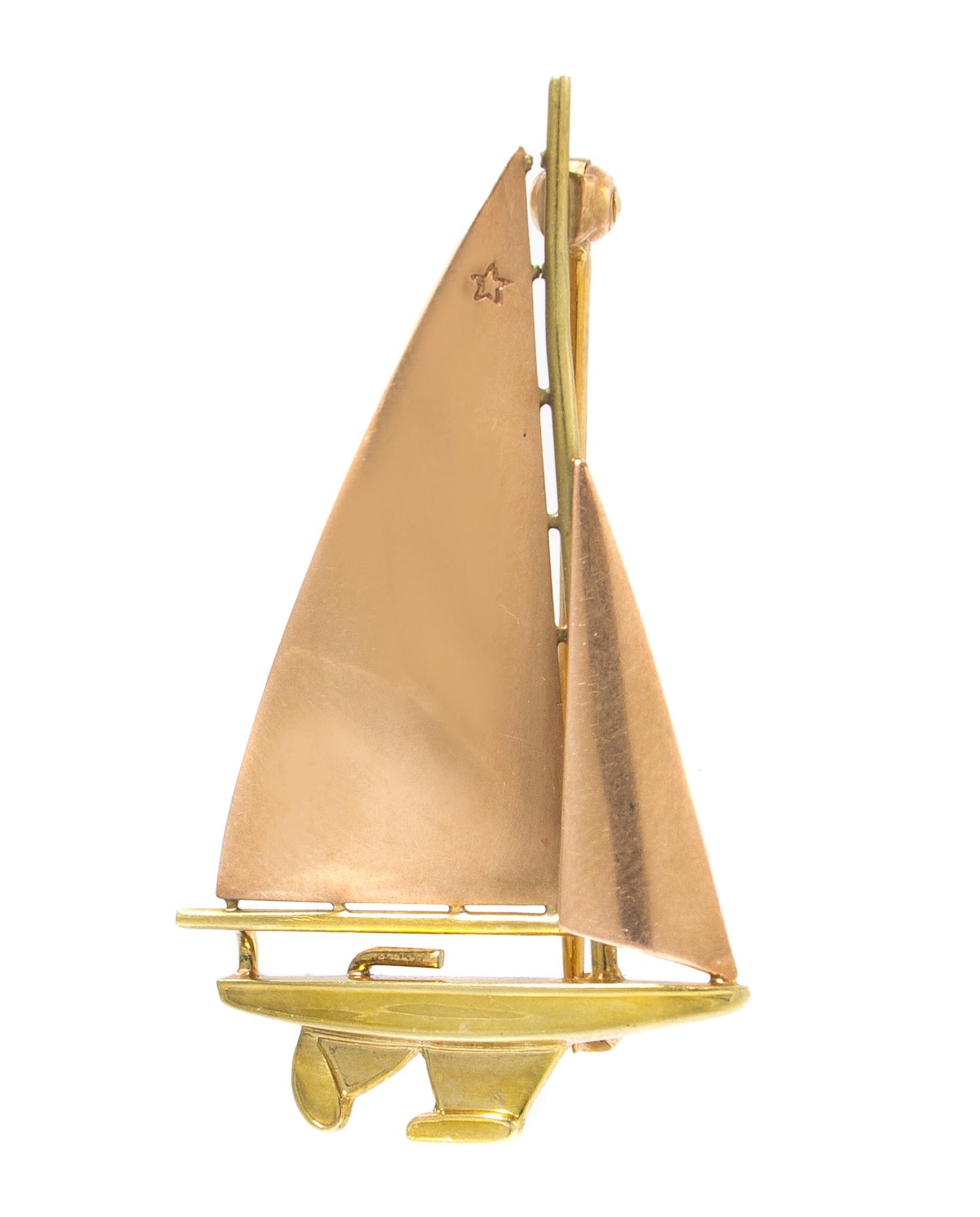 A Retro 14 Karat Rose and Yellow Gold Sailboat Brooch. 3.70 dwts.