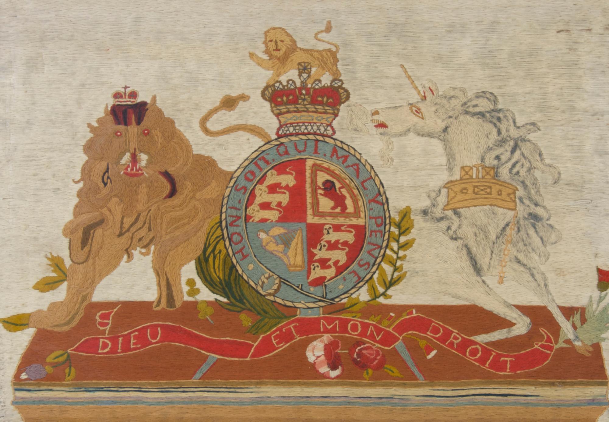 An English Framed Textile, Height 17 1/2 x width 24 inches.