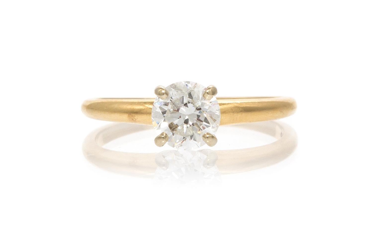 A 14 Yellow Gold and Diamond Solitaire Ring, 1.30 dwts.