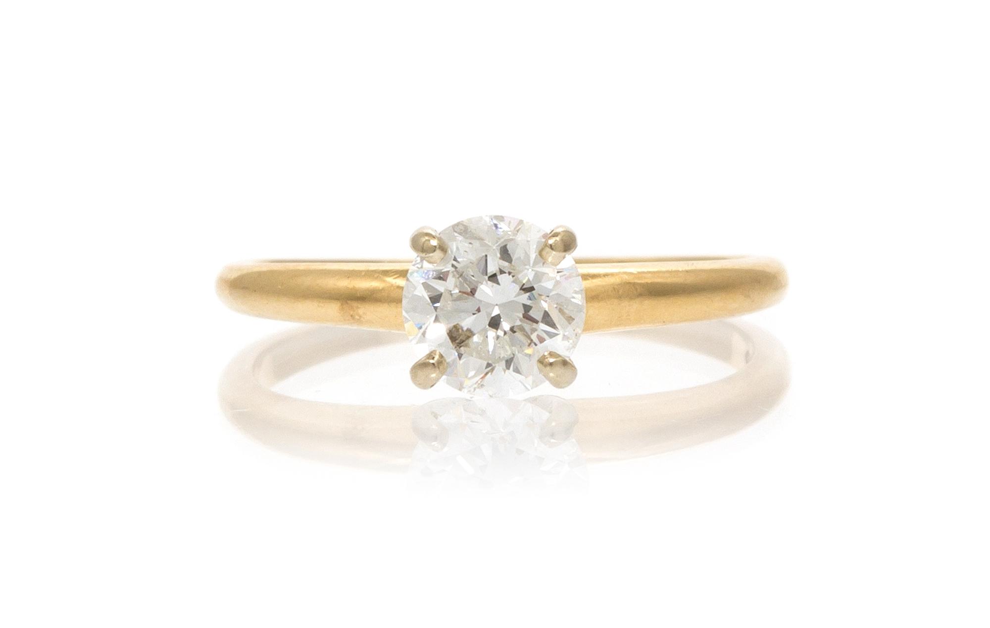 A 14 Yellow Gold and Diamond Solitaire Ring, 1.30 dwts.