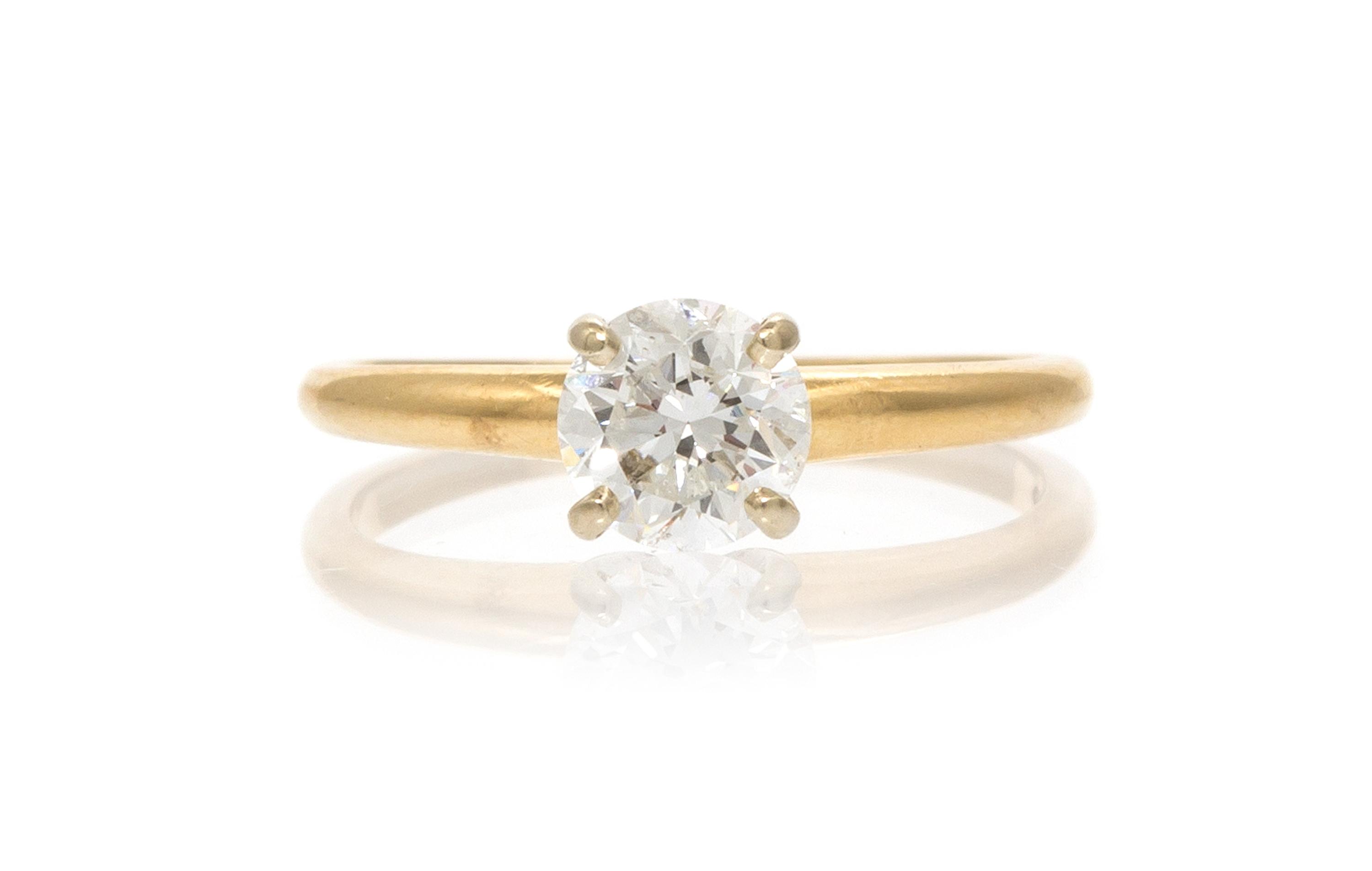A 14 Yellow Gold and Diamond Solitaire Ring, 1.30 dwts.