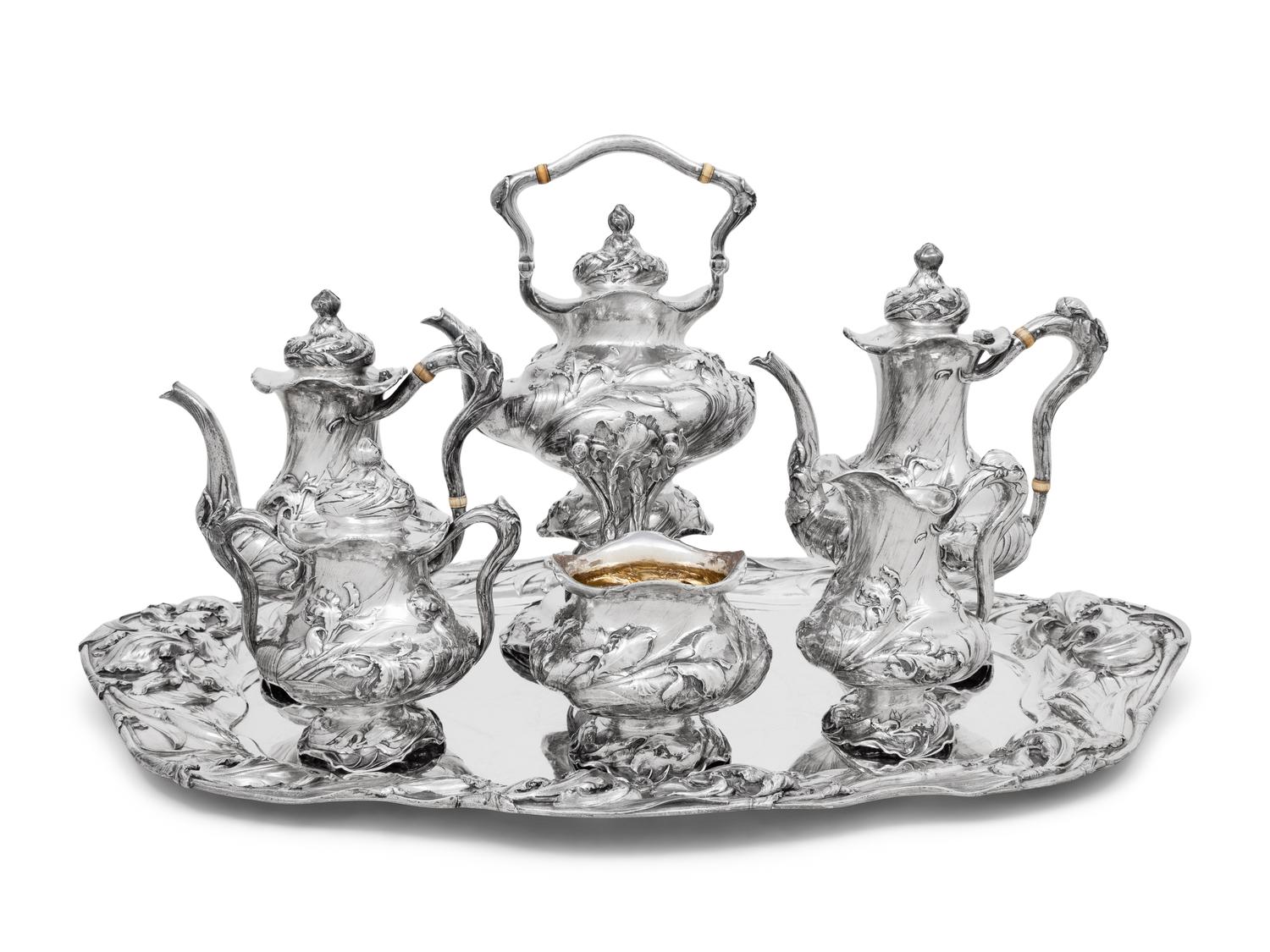 An American Silver Repoussé Eight-Piece Tea and Coffee Service