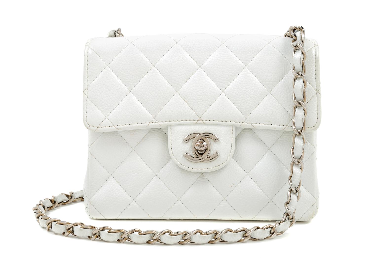 A Chanel White Caviar Mini Cross Body Flap Bag, 6.5" x 5.5" x 2.5"; Strap drop: 21"