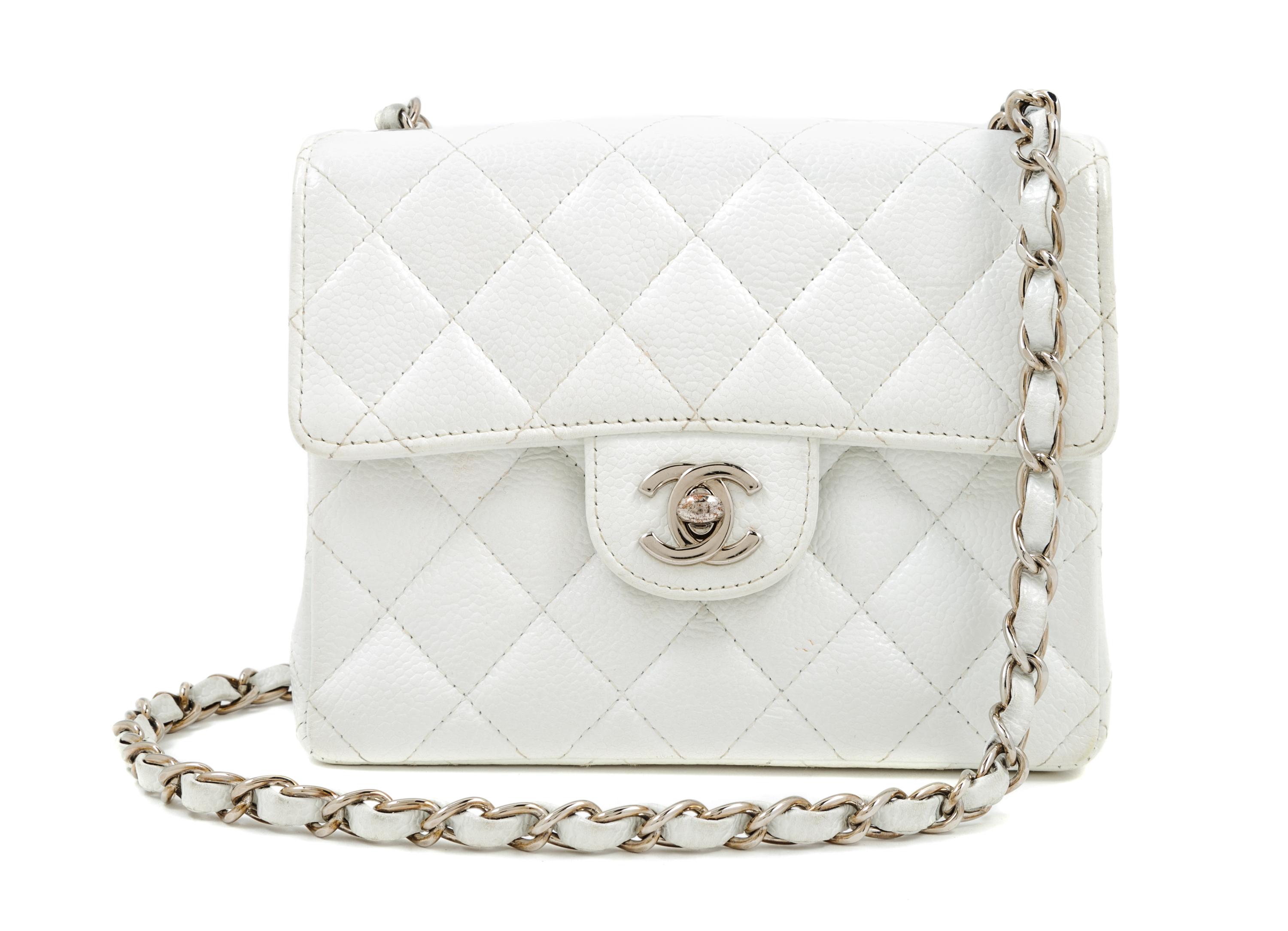 A Chanel White Caviar Mini Cross Body Flap Bag, 6.5" x 5.5" x 2.5"; Strap drop: 21"