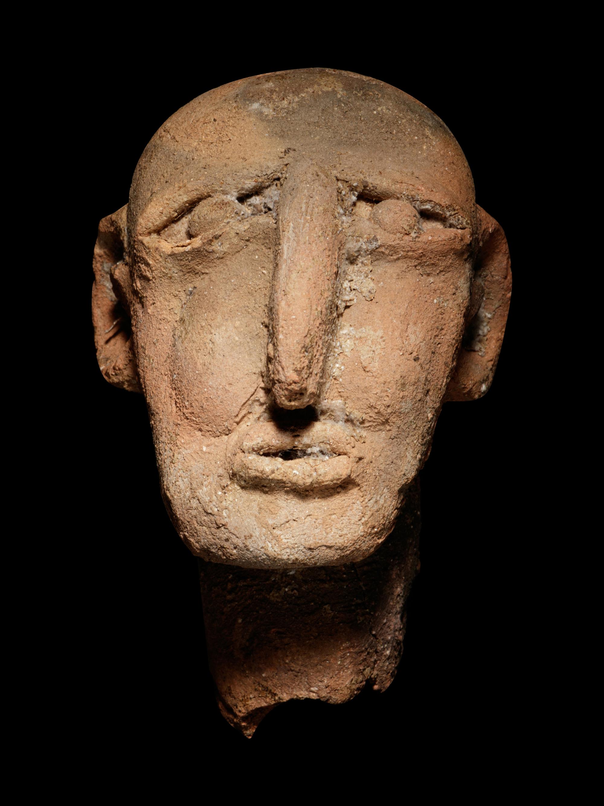 A Hellenistic Terracotta Head of a Grotesque