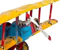 A Large Painted Canvas and Wood Model of a Biplane