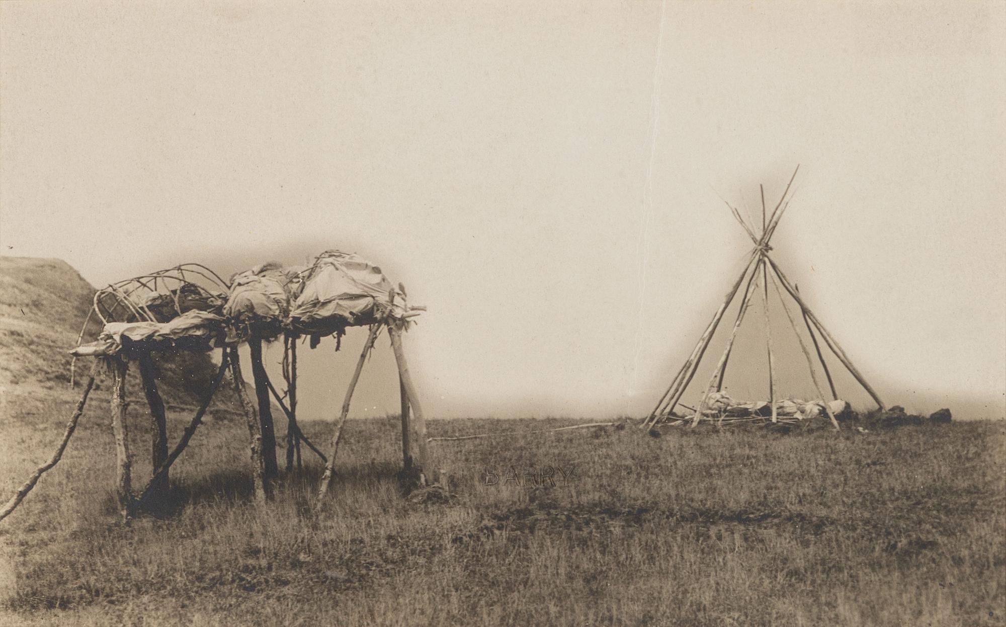 BARRY, David F. (1854-1934), photographer. Photograph of an Indian funeral scaffold with a tipi frame.