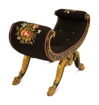 A Regency Ebonized and Parcel Gilt Curule Form Bench