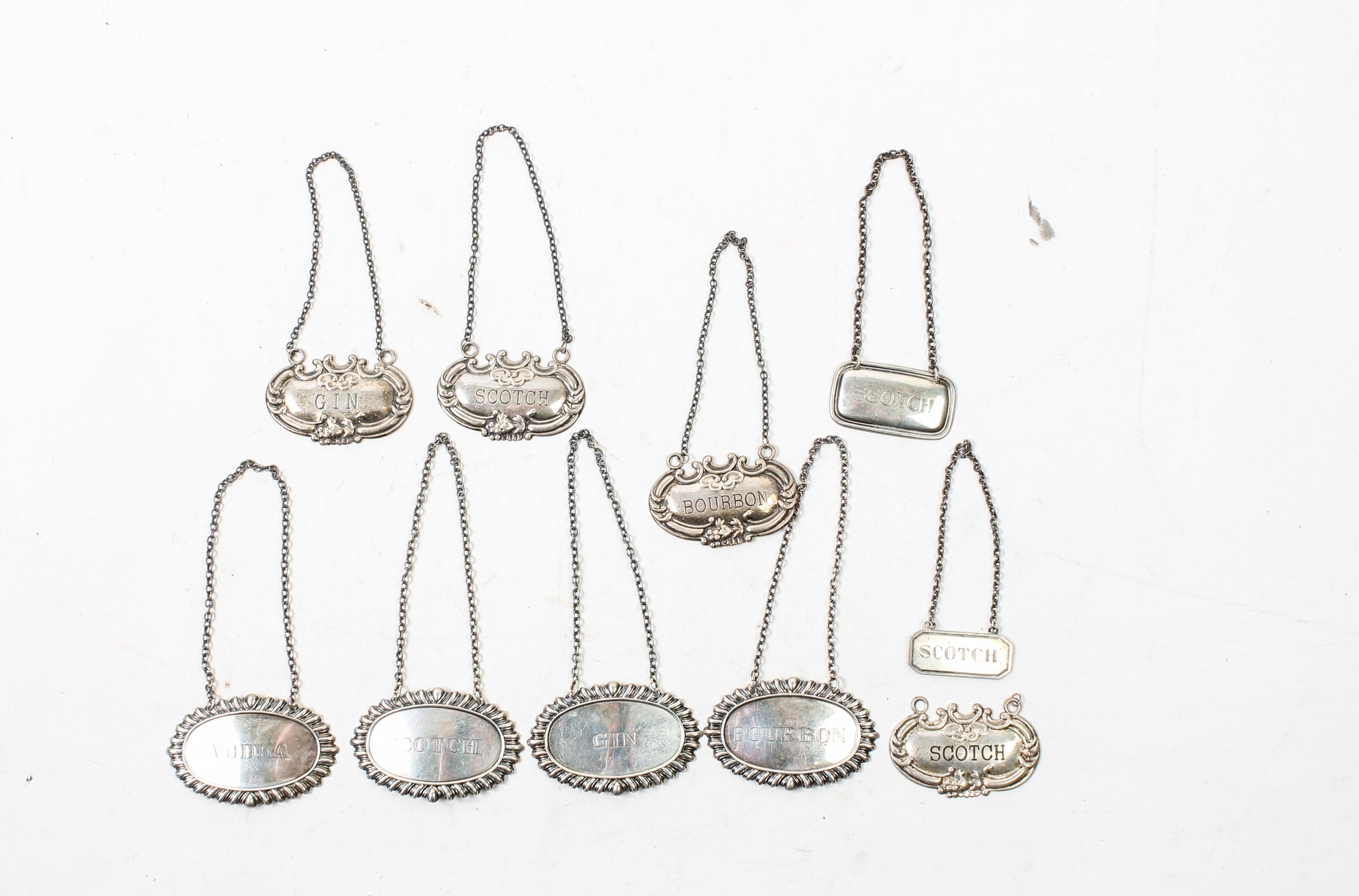 Ten American Silver Liquor Tags, Various Makers,