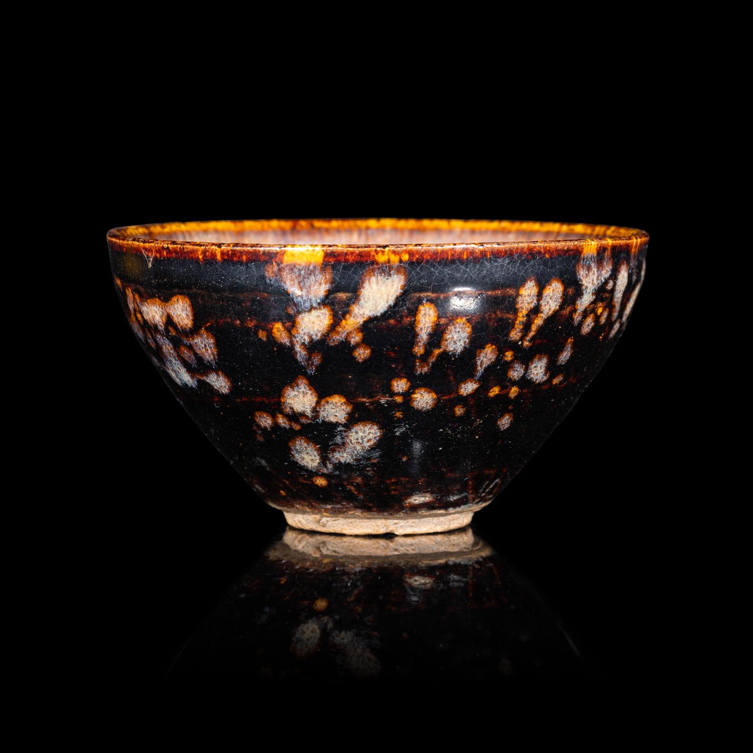 A Chinese Jizhou 'Papercut' Teabowl, Possibly Southern Song Dynasty 或為南宋 吉州窯貼花盞