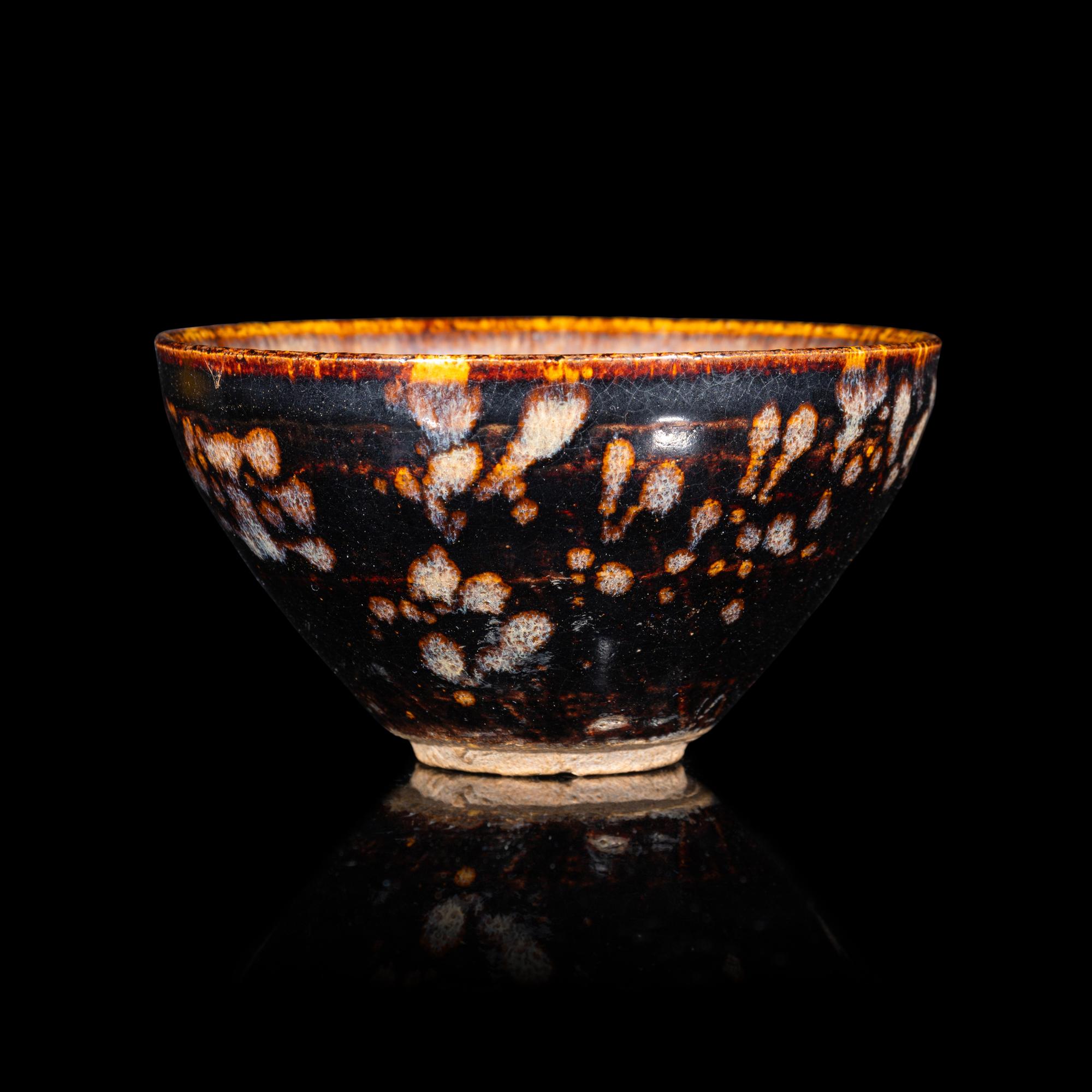 A Chinese Jizhou 'Papercut' Teabowl, Possibly Southern Song Dynasty 或為南宋 吉州窯貼花盞