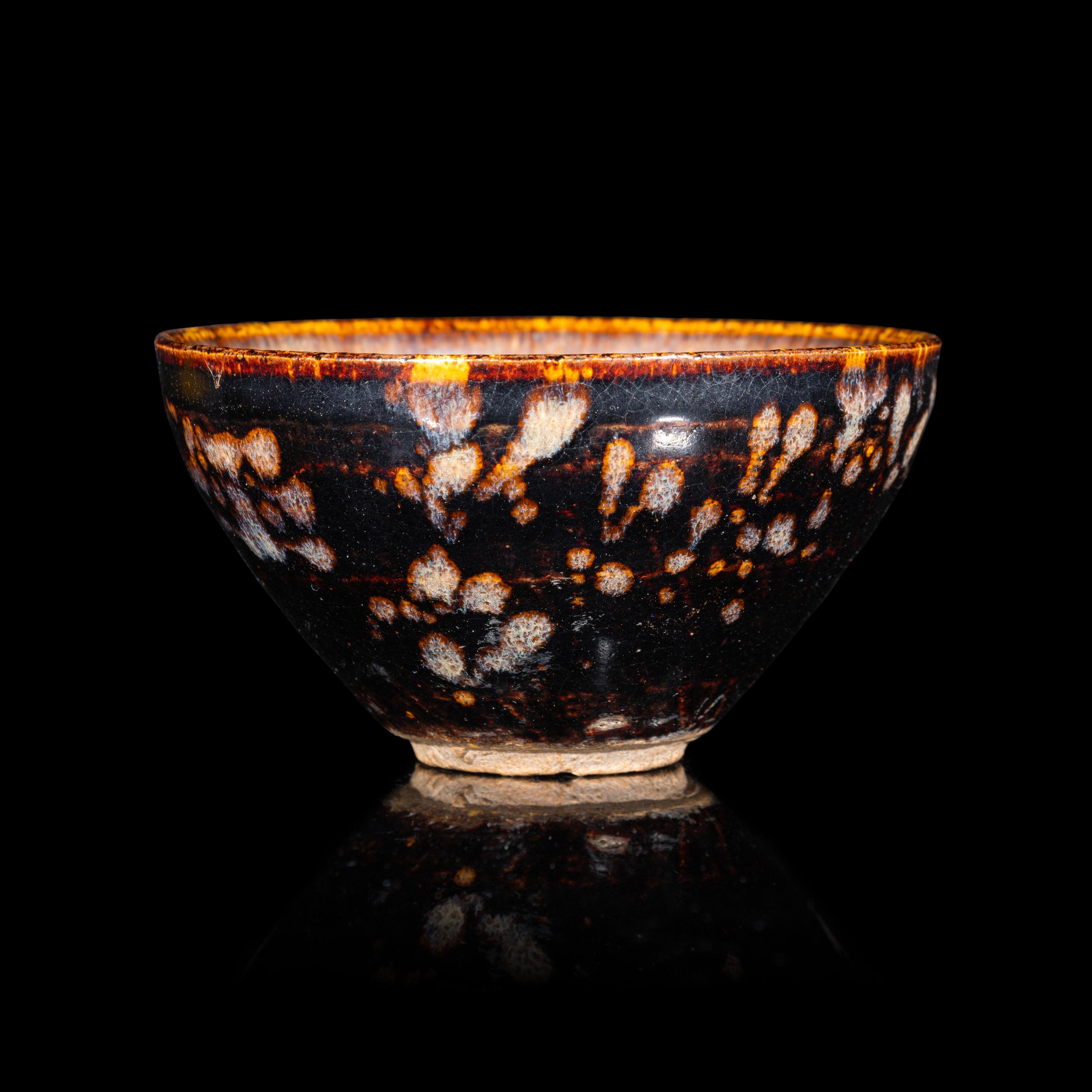 A Chinese Jizhou 'Papercut' Teabowl, Possibly Southern Song Dynasty 或為南宋 吉州窯貼花盞