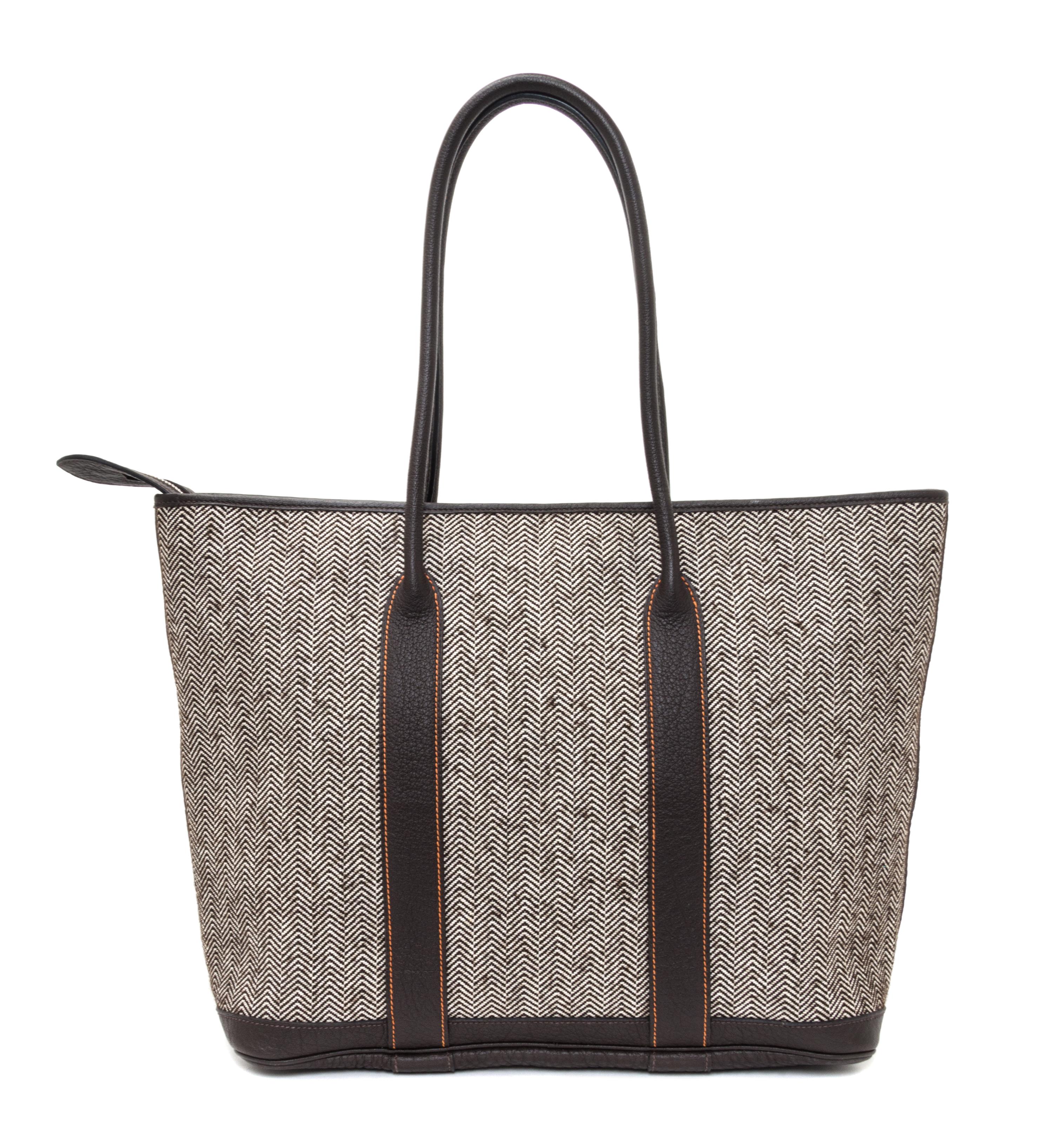 An Hermes Ecru Chevron Tweed and Ebene Leather Tote Bag, 12.5" x 14" x 5".