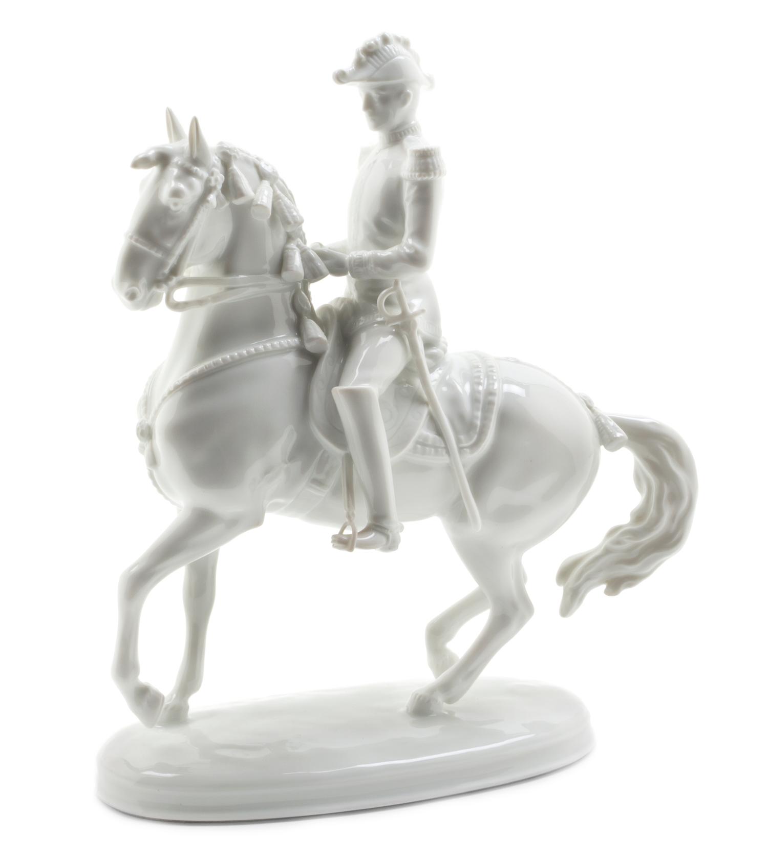 An Austrian Blanc de Chine Equestrian Group, Height 9 5/8 inches.