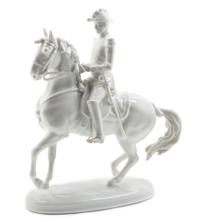 An Austrian Blanc de Chine Equestrian Group, Height 9 5/8 inches.
