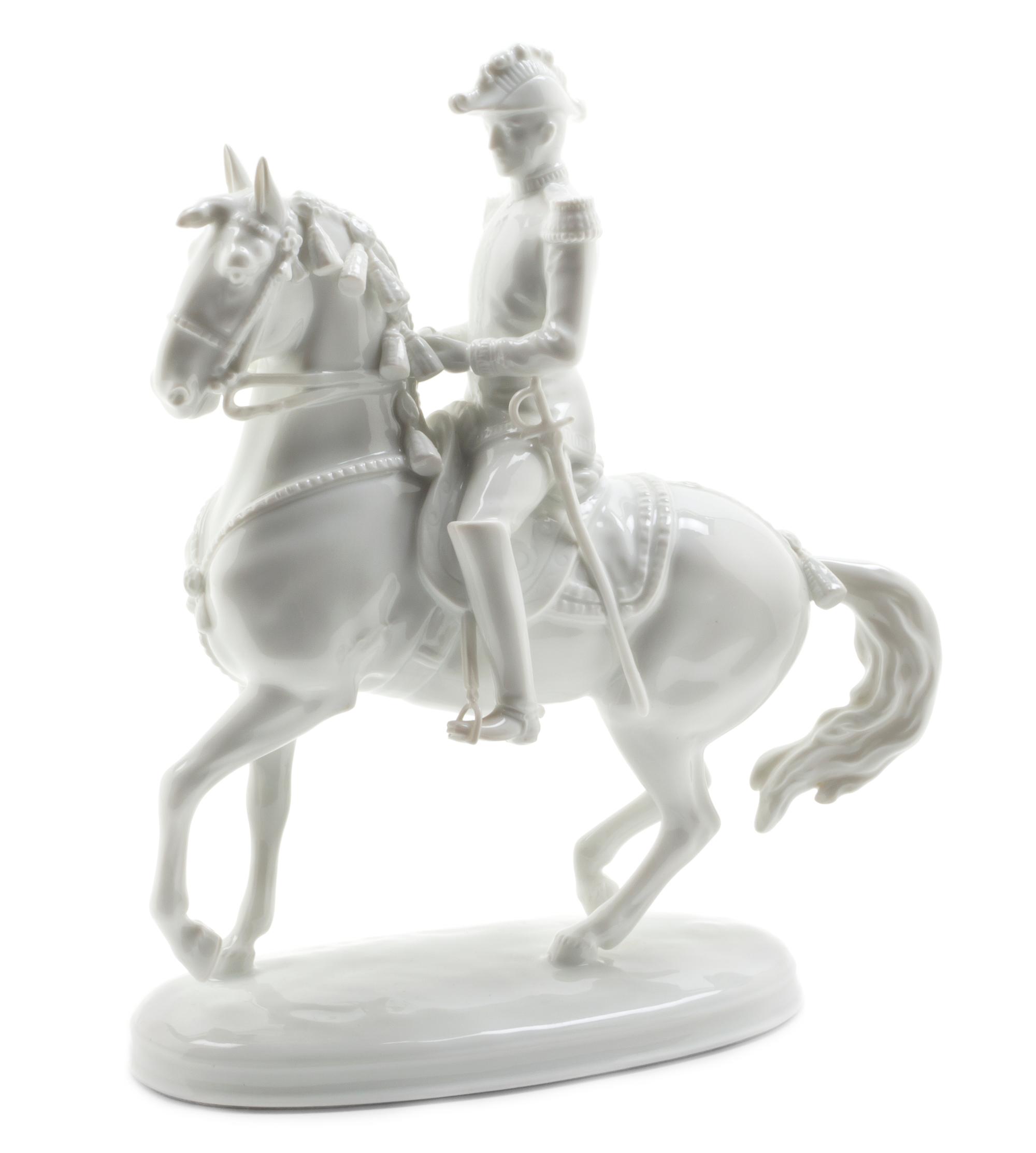 An Austrian Blanc de Chine Equestrian Group, Height 9 5/8 inches.