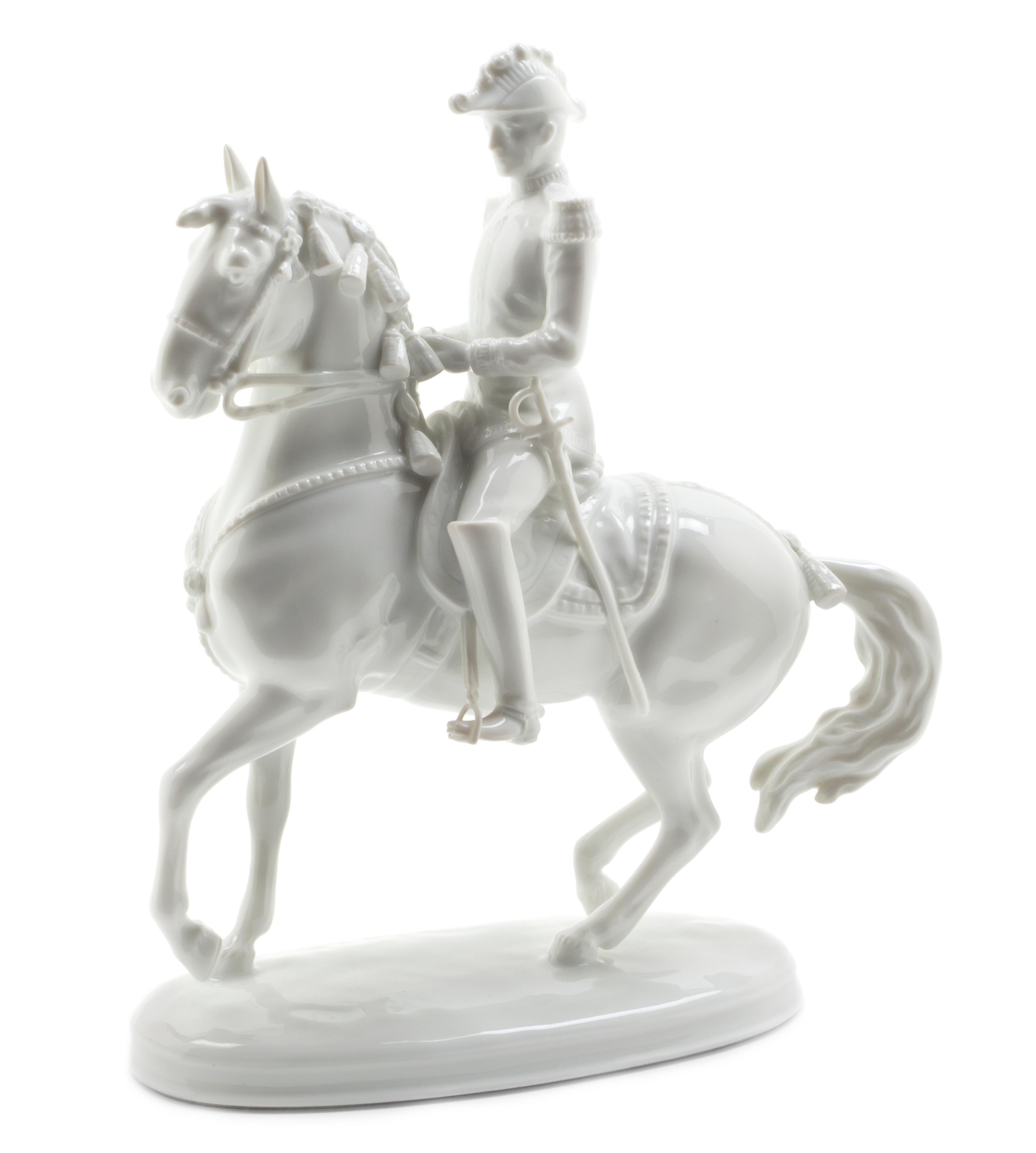 An Austrian Blanc de Chine Equestrian Group, Height 9 5/8 inches.