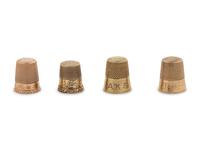 A Group of Four American Yellow-Gold Thimbles