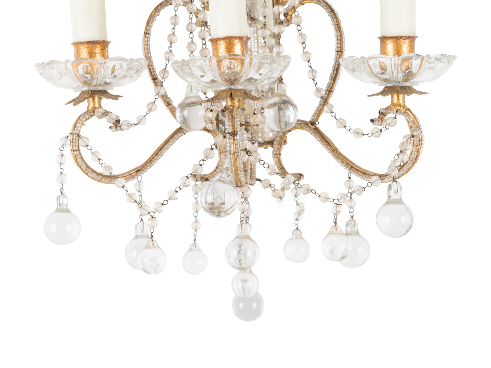 A Pair of Beaded Three-Light Sconces