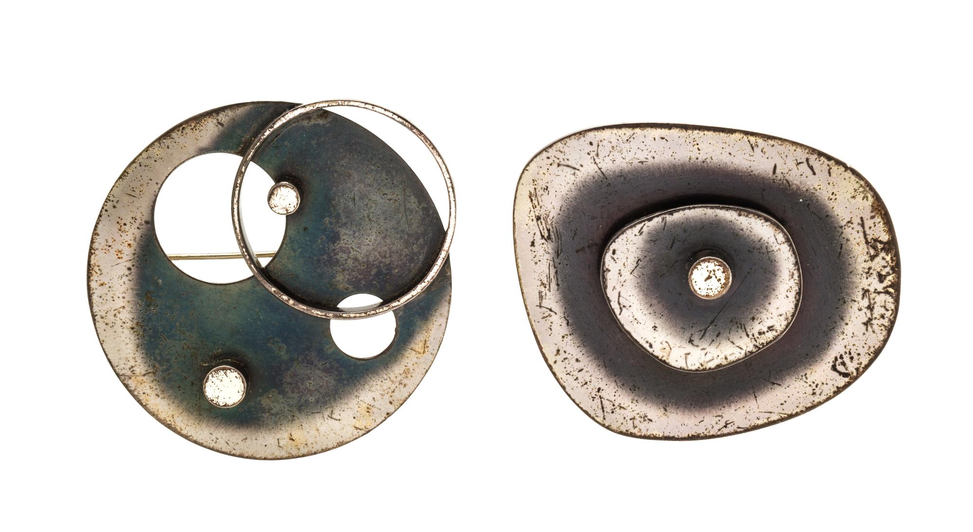 A Collection of Mid-Century Modern Sterling Silver Brooches, Nita Lustig, 14.60 dwts.