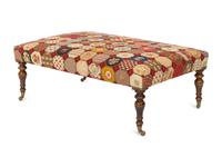 A Mahogany Needlepoint Upholstered Ottoman