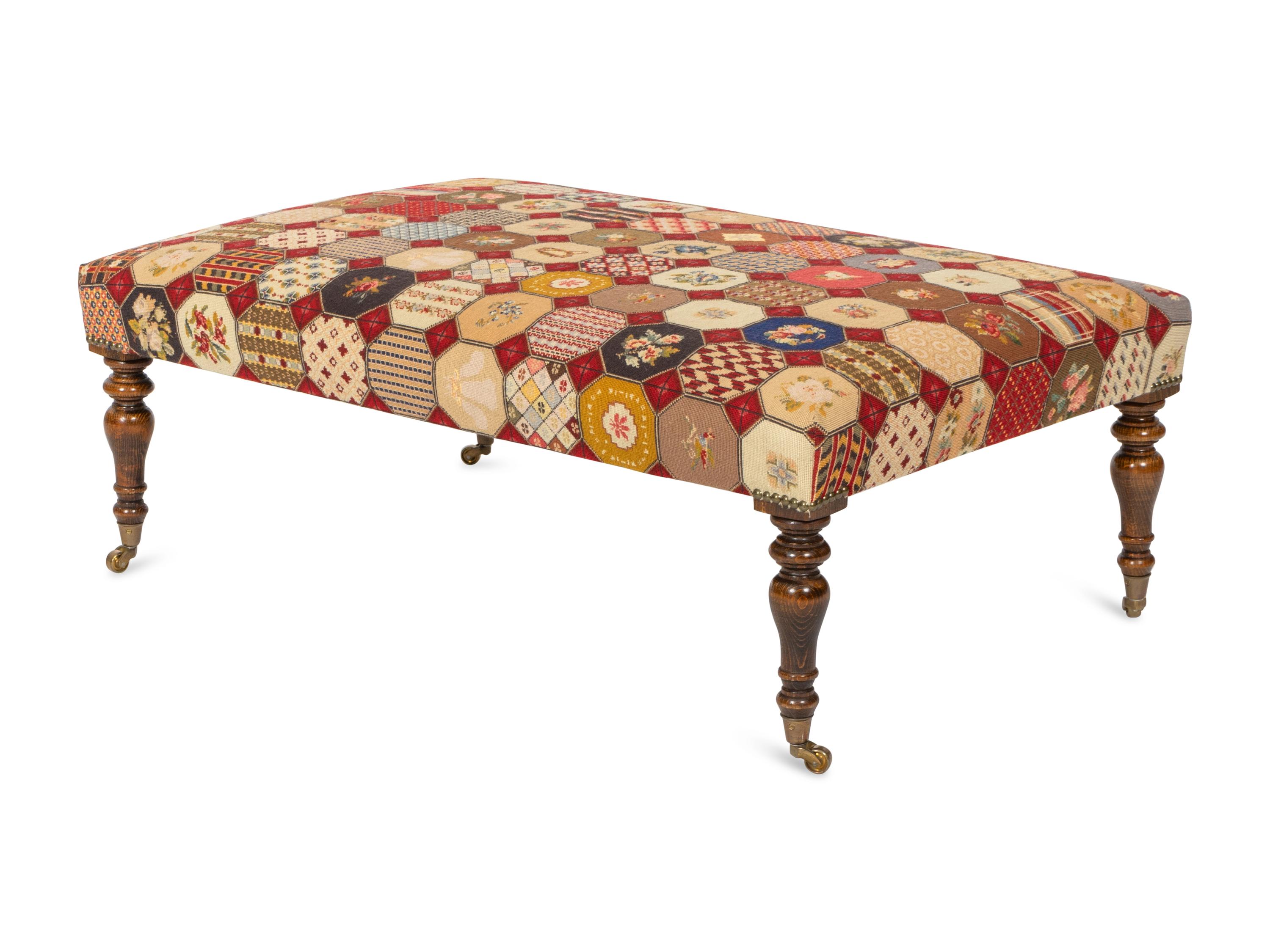 A Mahogany Needlepoint Upholstered Ottoman