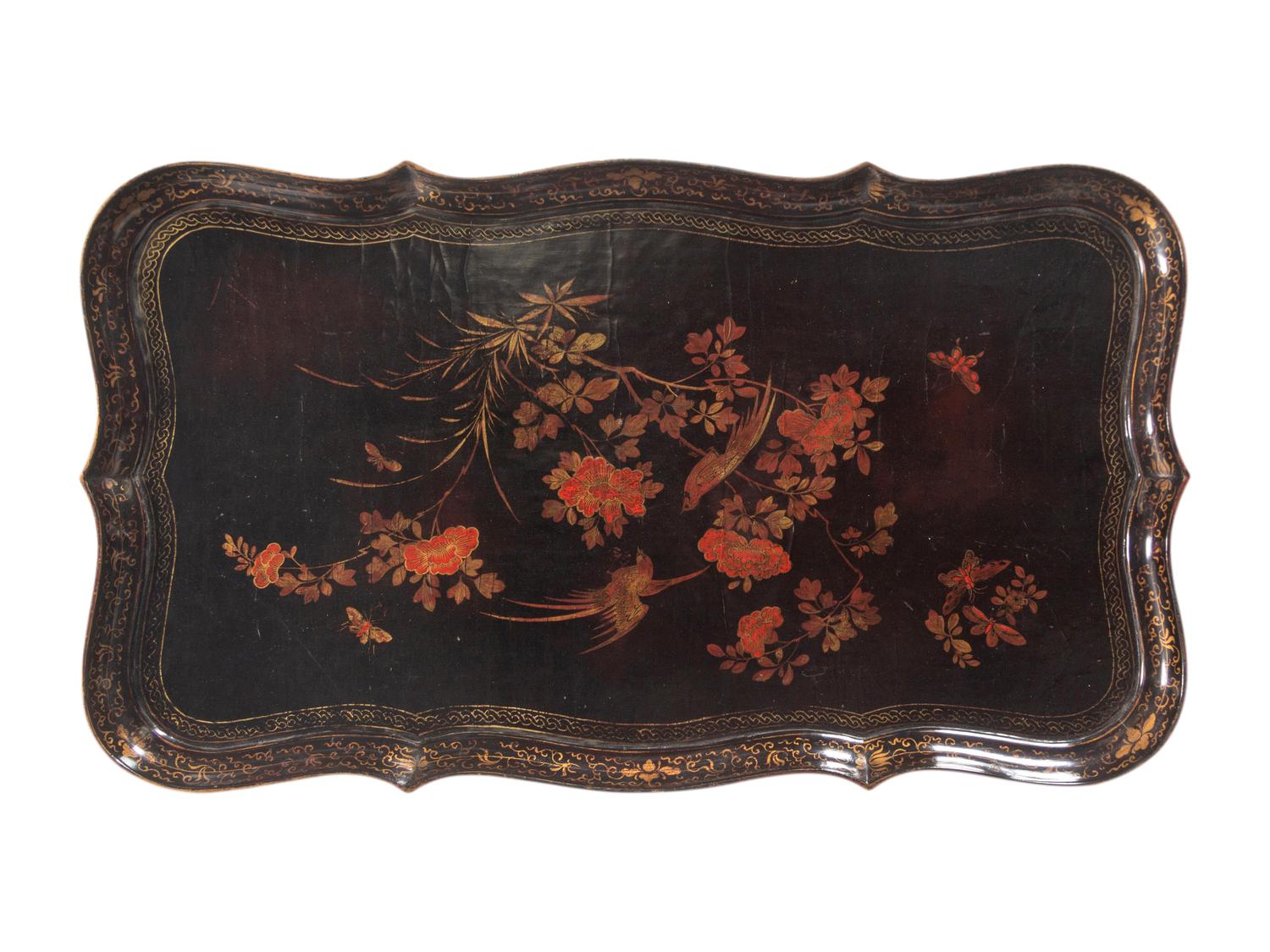A Chinese Export Lacquer Tray on a Later Stand