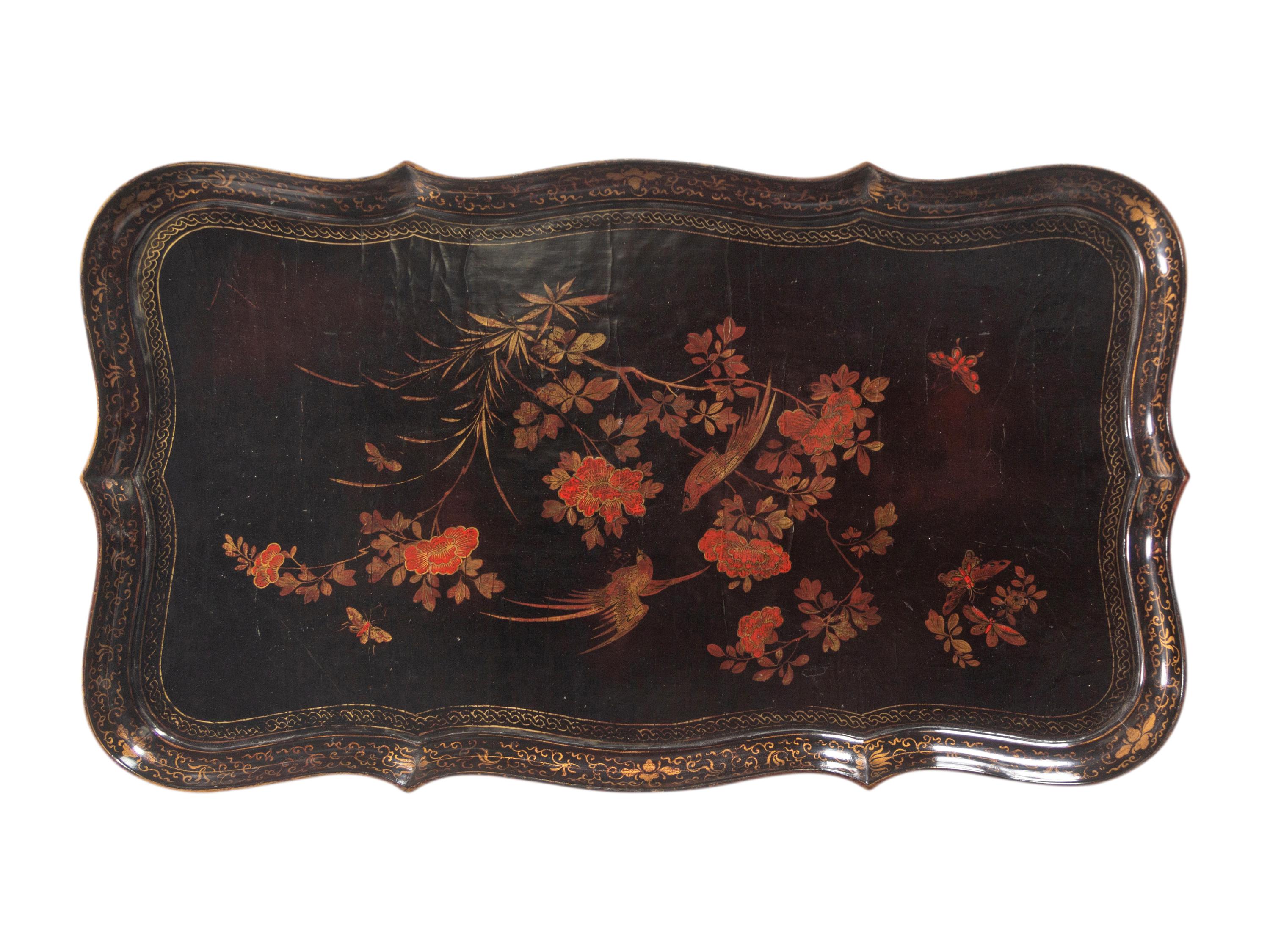 A Chinese Export Lacquer Tray on a Later Stand