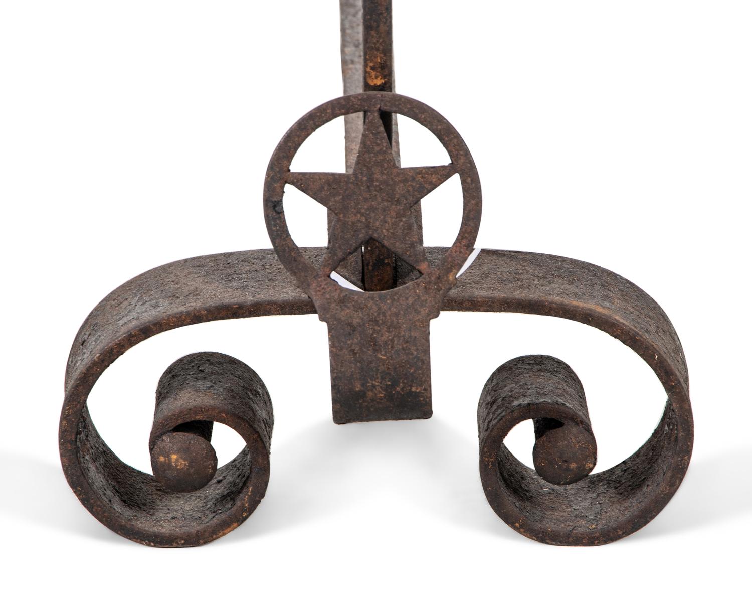 A Pair of Iron Andirons with Star Ornaments