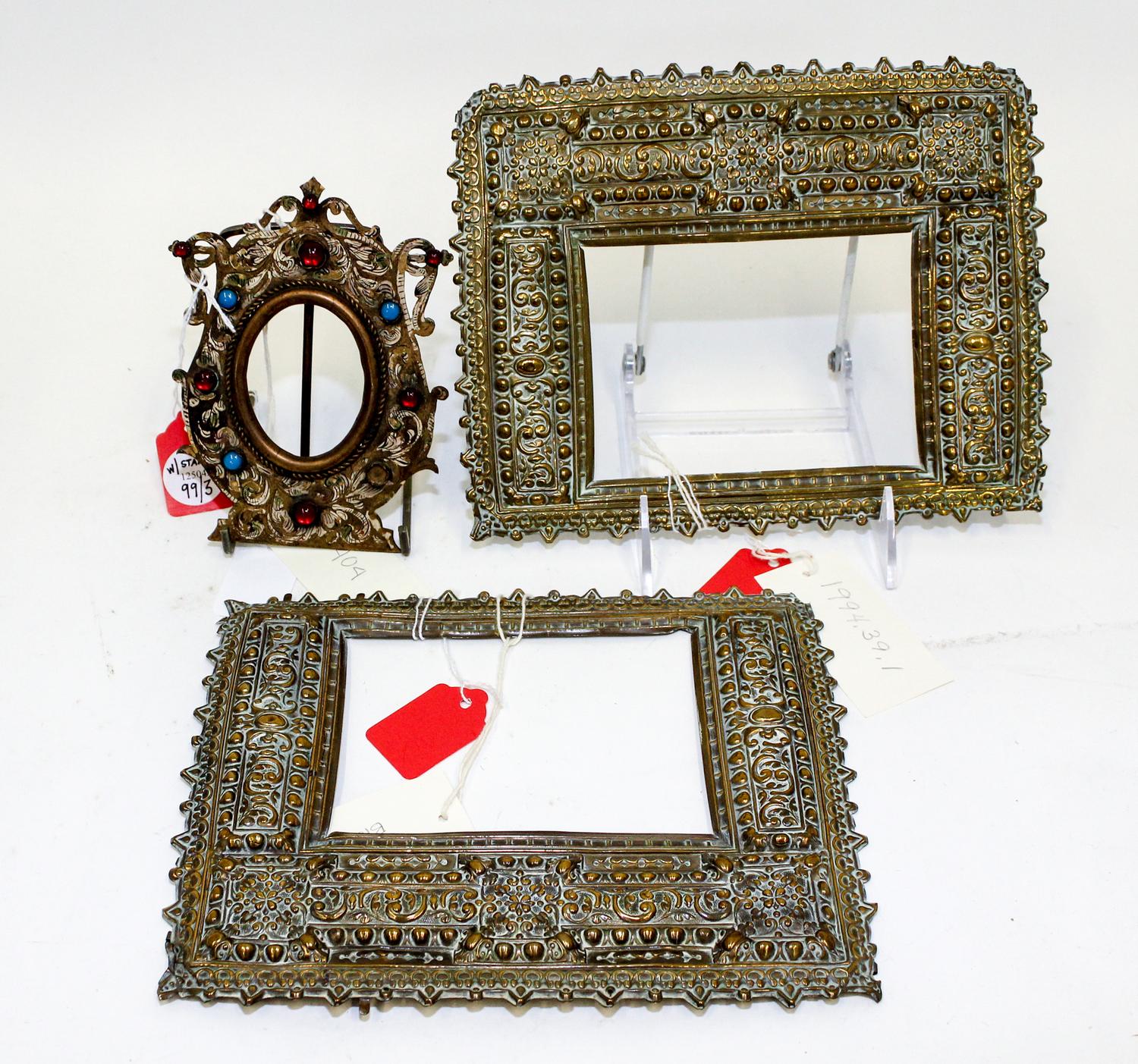 A Pair of Spanish Baroque Style Pressed Brass Frames Each 7 x 8 7/8 inches. — 19TH CENTURY