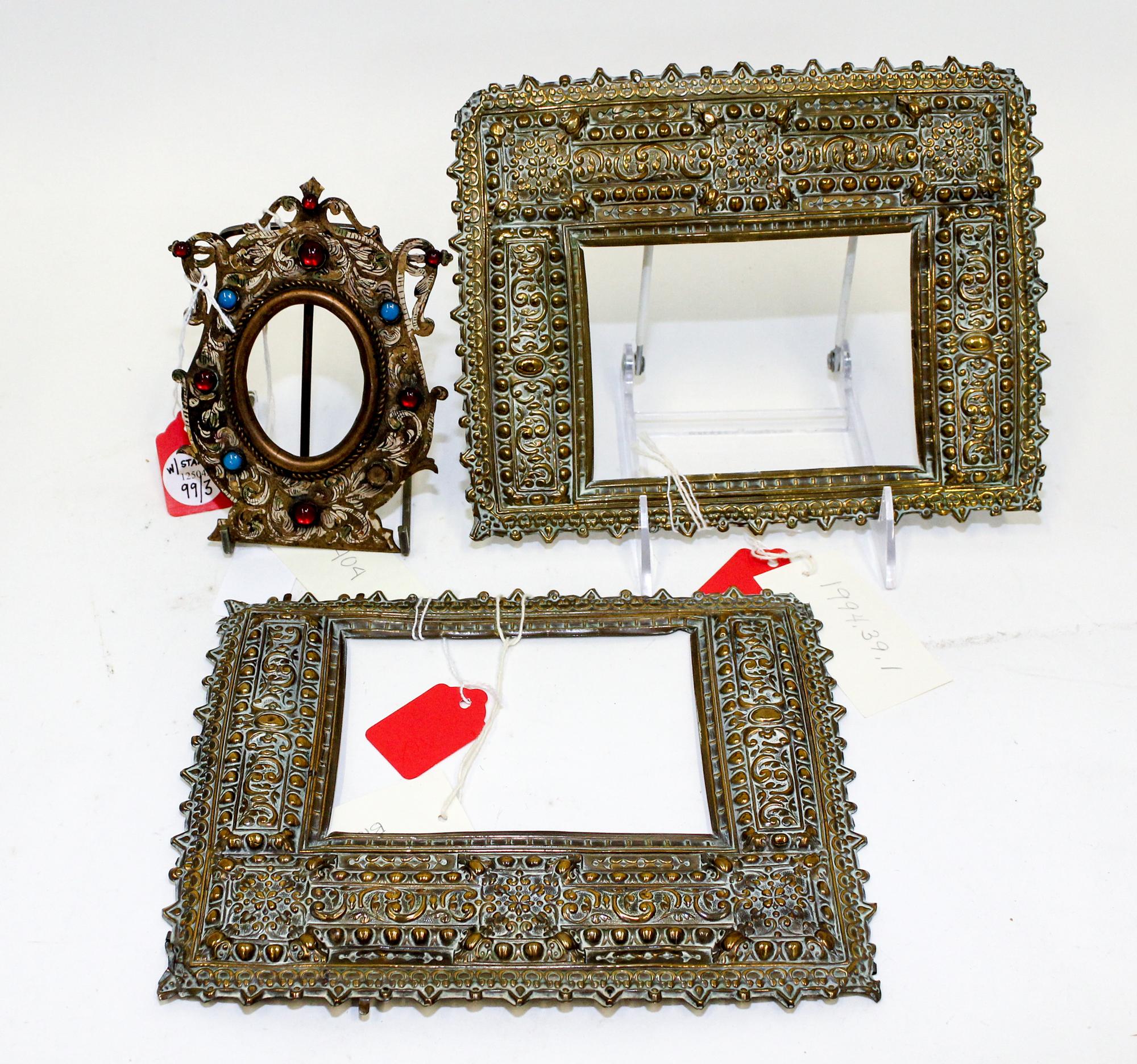 A Pair of Spanish Baroque Style Pressed Brass Frames Each 7 x 8 7/8 inches. — 19TH CENTURY