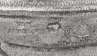 A Silver Model of a Crab and Lionfish