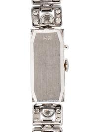 GENÈVE, WHITE GOLD AND DIAMOND SURPRISE WATCH
