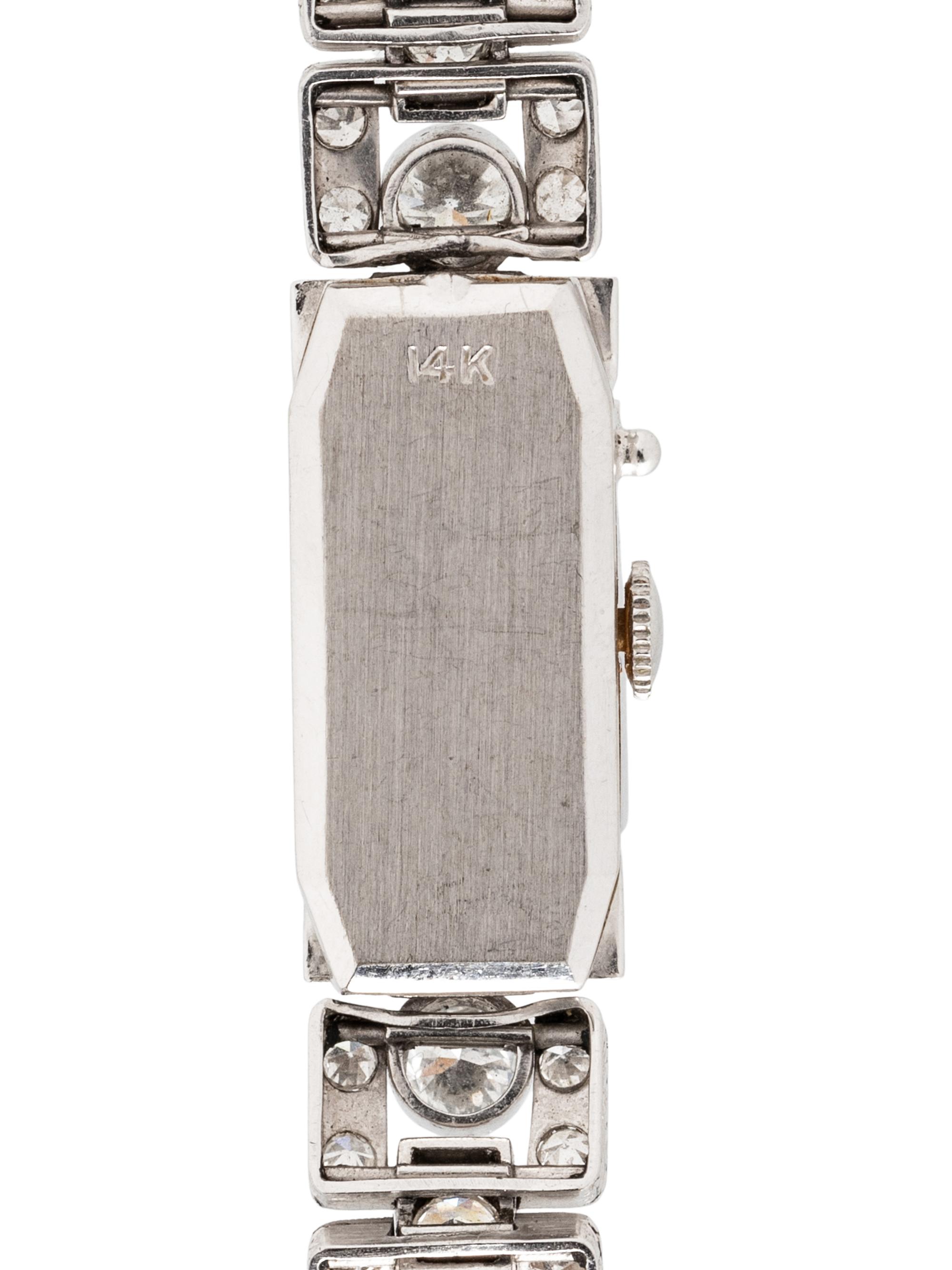 GENÈVE, WHITE GOLD AND DIAMOND SURPRISE WATCH