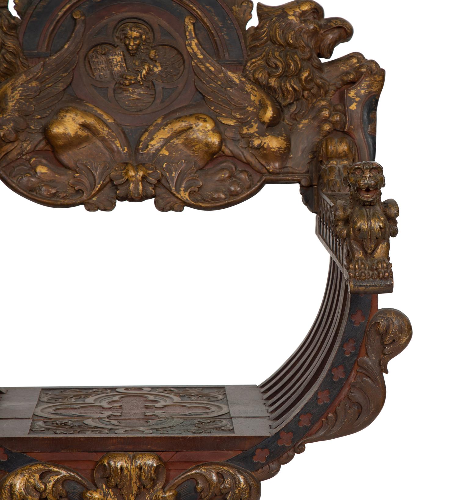 An Italian Painted and Parcel Gilt Savonarola Armchair