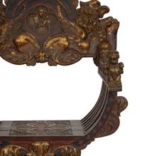 An Italian Painted and Parcel Gilt Savonarola Armchair