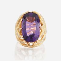 An amethyst, diamond, and gold ring
