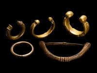 Five African Metalwork Currency Bracelets