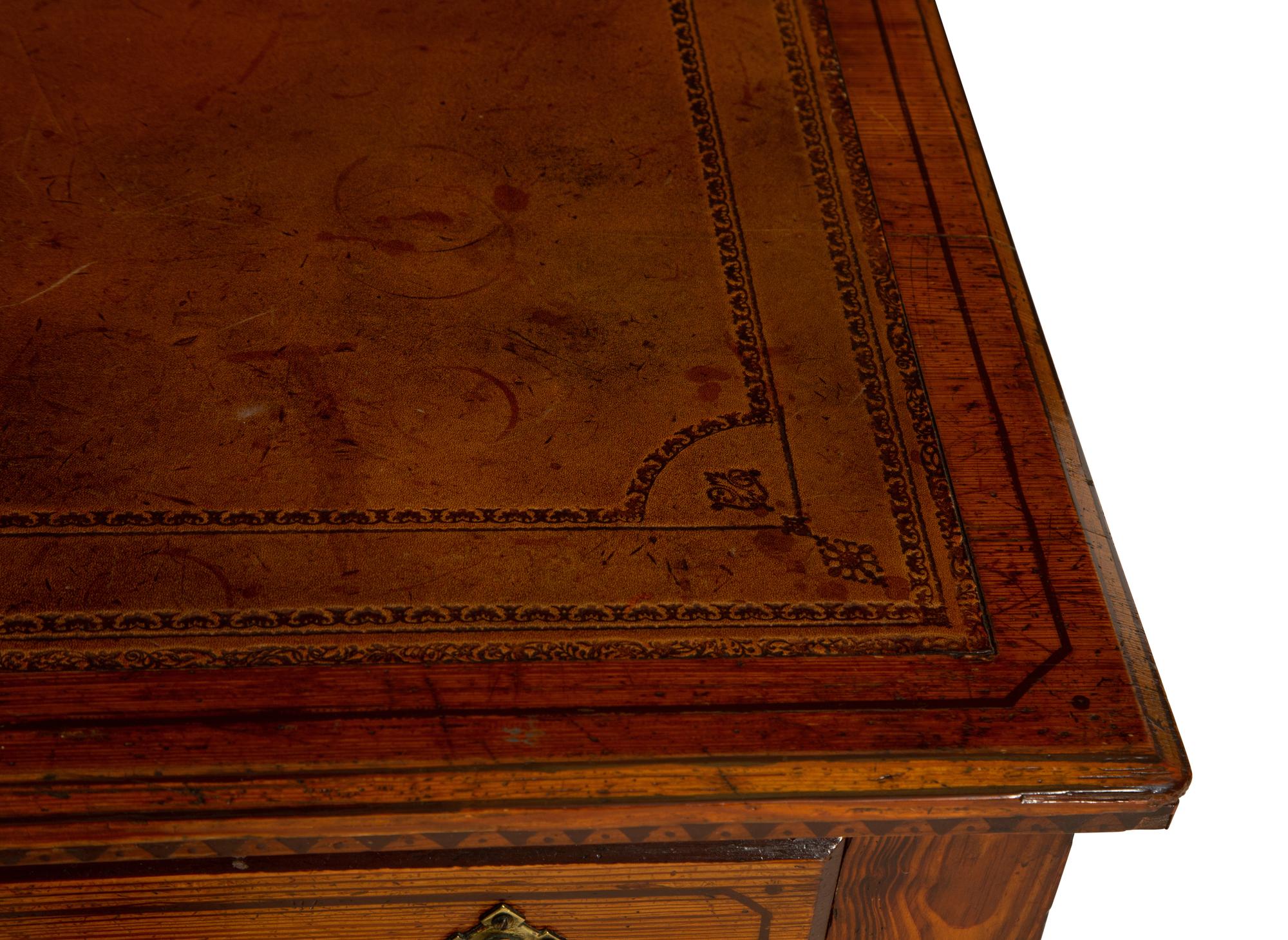 An English Arts and Crafts Style Stained Oak Writing Desk