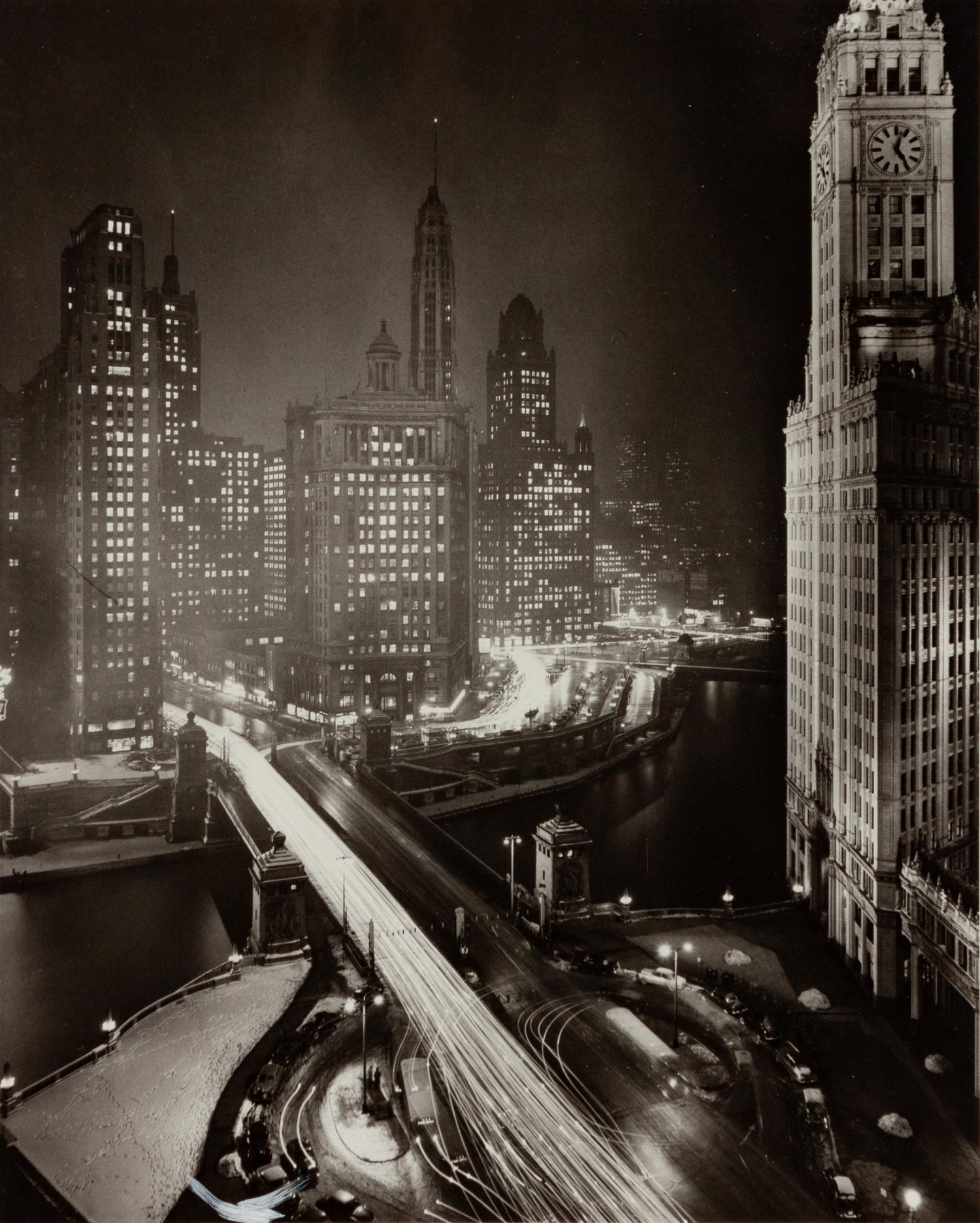 A group of four photographs depicting Chicago ( Rush Street, Chicago's Night Club District , c. 1950; Wrigley Building at Night, Michigan Ave. Bridge , c. 1950; Chicago , c. 1935; State Street and Marshall Field Clock , c. 1950)