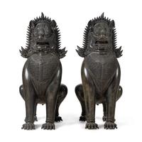 A Pair of Patinated Bronze Guardian Lions