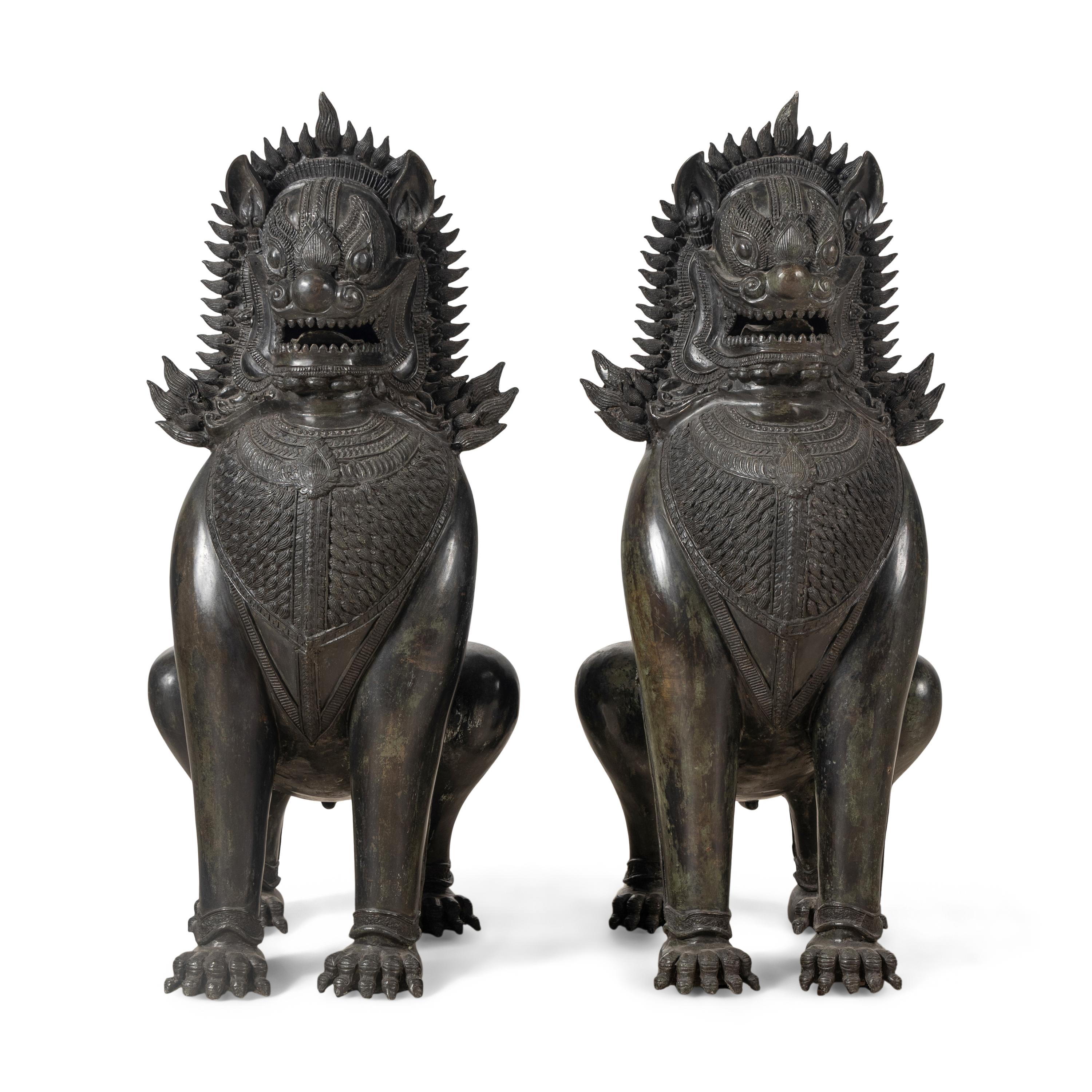 A Pair of Patinated Bronze Guardian Lions