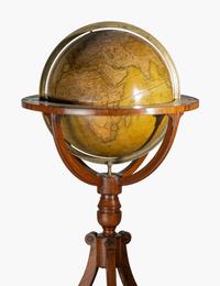 A Pair of Regency Mahogany Terrestrial and Celestial Fifteen-Inch Library Globes