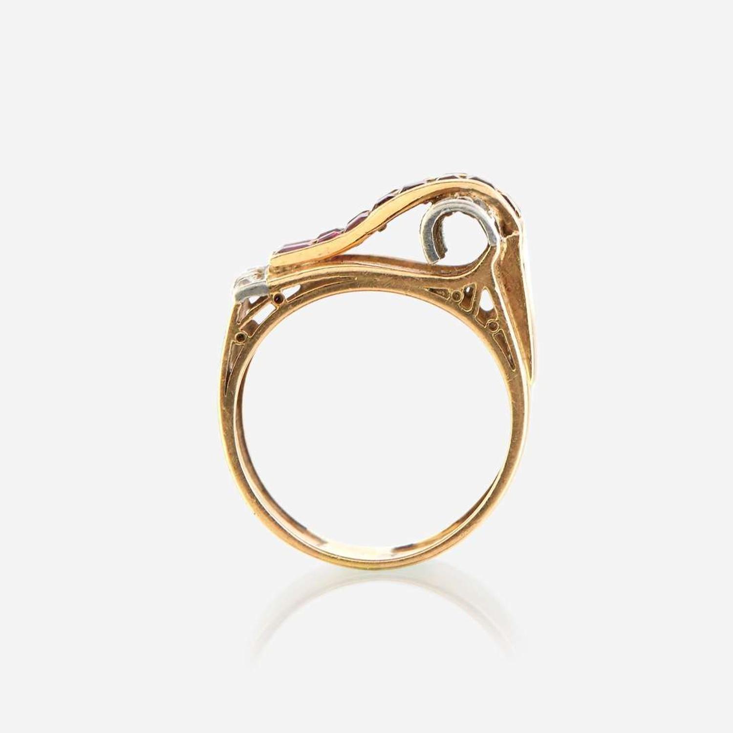 A Retro ruby, diamond, eighteen karat gold, and platinum ring