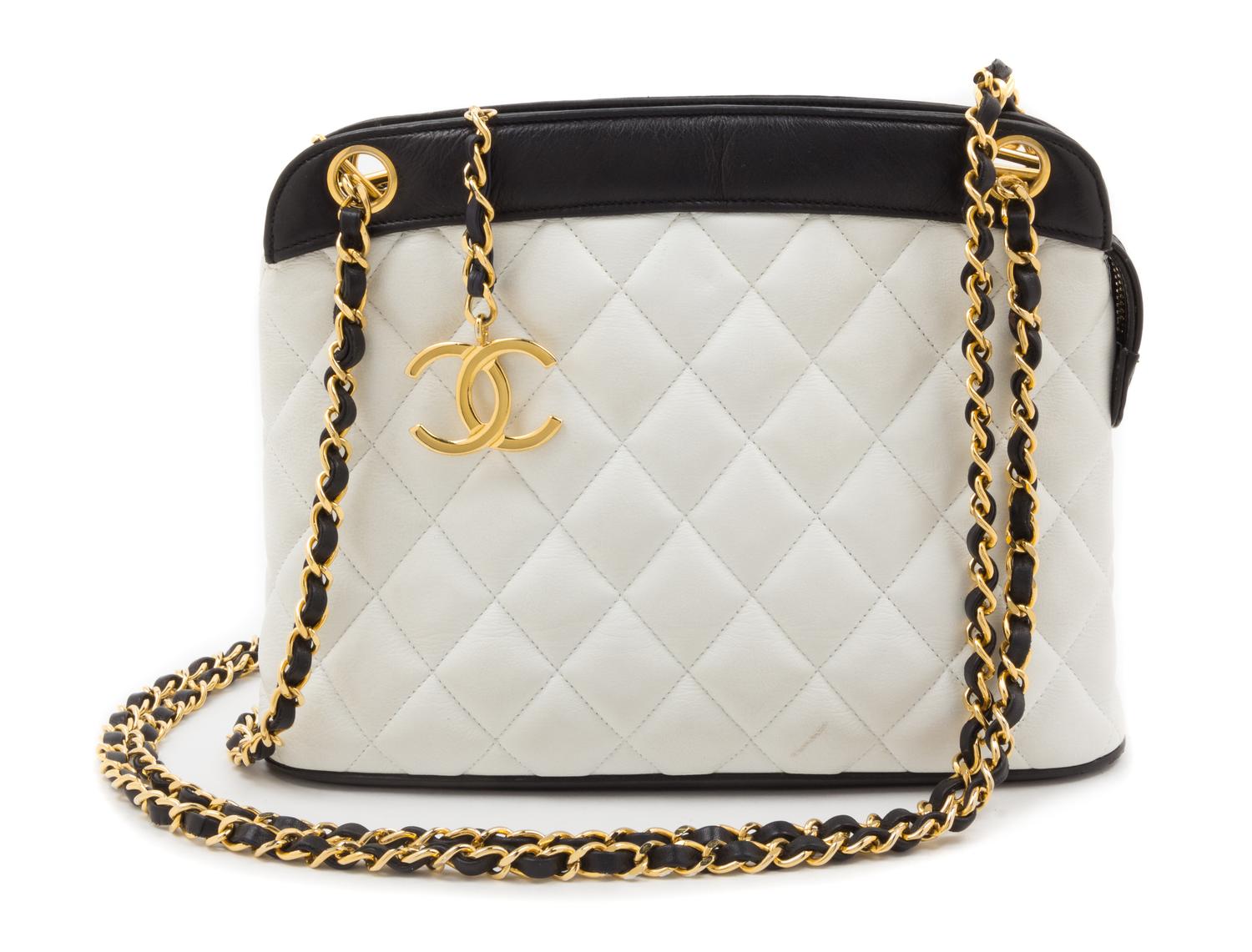 A Chanel White Leather Quilted Handbag, 10.5" x 8".