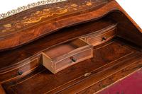A Louis XV Style Gilt Bronze Mounted Marquetry Bureau en Pente