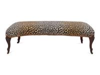 A Victorian Carved Mahogany Reniform Ottoman